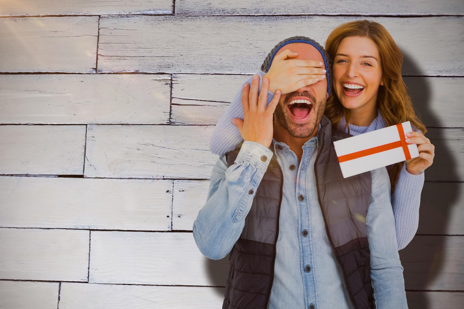 Couple opening a surprise gift